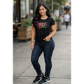 Model wearing black autism awareness shirt with colorful celebrate design