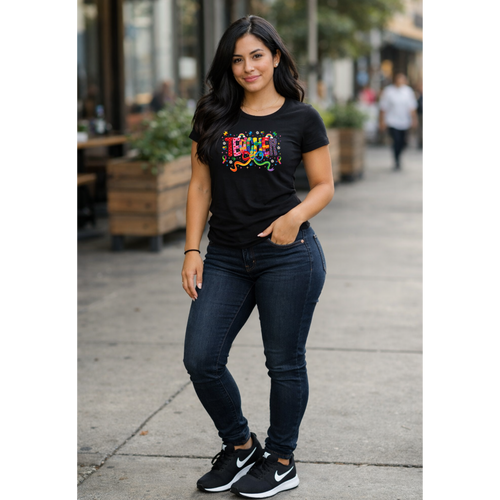 Model wearing black autism awareness shirt with colorful celebrate design